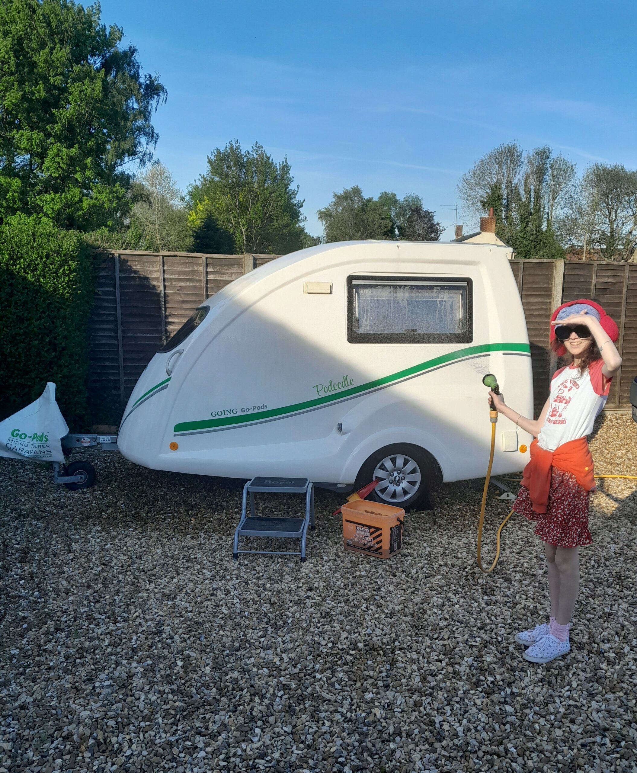 Daisy Mae washing a caravan
