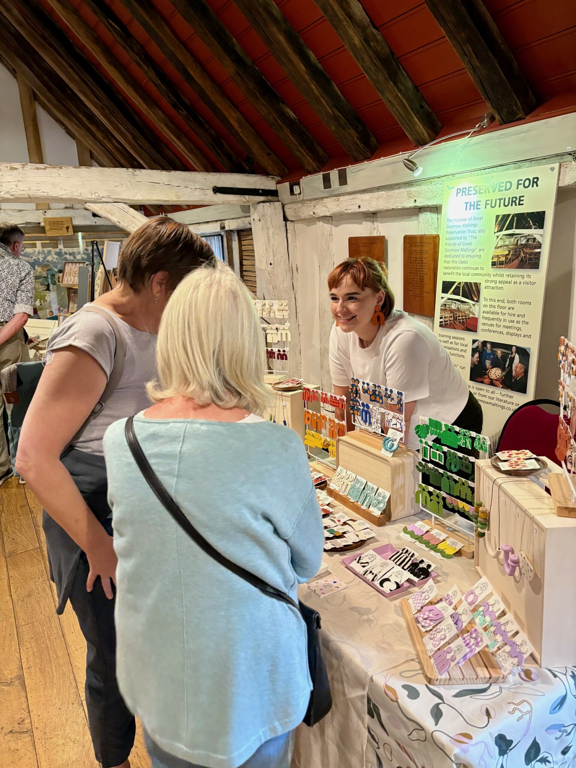 Customers at Great Dunmow Makers Market visiting the Young Trader stalls